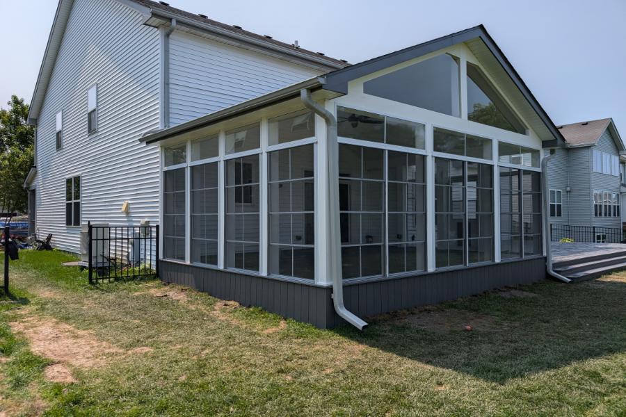 Screen Room with Trex® Transcend Lineage Island Mist Skirting and Sunspace Panels Lake Villa