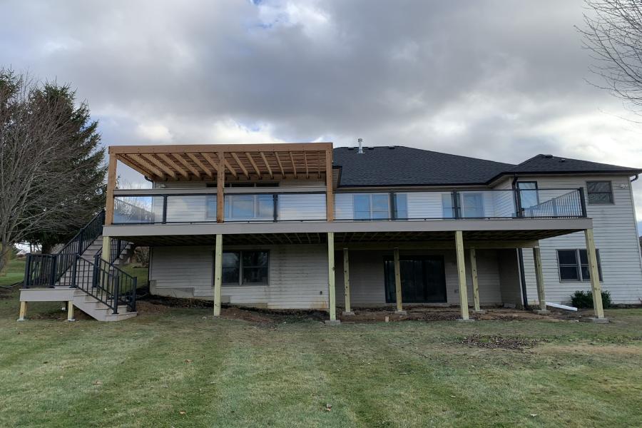 Timbertech® Azek Landmark French White Oak with Trex® Signature Rails, Glass Panels, and Pergola Johnsburg