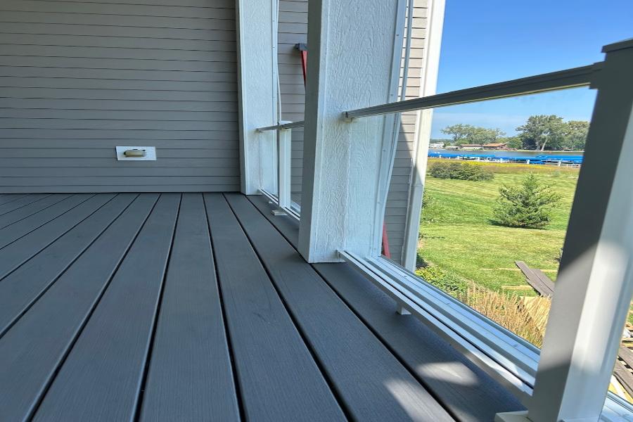 Trex® Decking Lineage Island Mist with Trex® Signature Rails and Glass Inserts Antioch