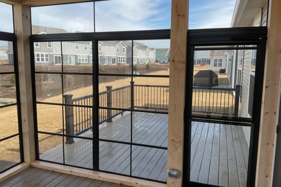 Screen Room with Timbertech® Deck Reserve Reclaimed Chestnut with Sunspace Panels and Sunspace Door in Black Huntley